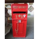 A reproduction Elizabeth II style wall mounted postal box, of rectangular form, 59cm high.
