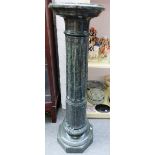 A late 19th century variegated green marble display pedestal,