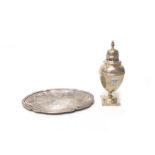 A silver sugar caster, having a wrythen knop finial,