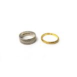 A gold decorated wedding ring, detailed 22ct, ring size O and a half, weight 2.