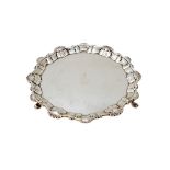 An early George III silver salver, of shaped circular form,