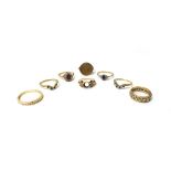 A set of three 9ct gold, sapphire and diamond set rings,