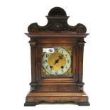 A walnut cased mantel clock, late 19th century, with a two train Westminster type movement, 44.