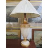 A set of three modern plaster table lamps,
