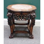 A late 19th century Chinese carved hardwood jardiniere stand, with inset marble top,