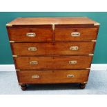 A campaign style brass bound mahogany chest of two short and three long drawers,