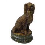 A large pottery model of a spaniel, 19th century, possibly Staffordshire,