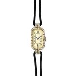 A lady's 18ct white gold and diamond set rectangular cased dress wristwatch,