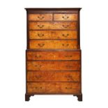 A mid-18th century solid elm chest-on-chest,