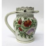 A Bristol earthenware puzzle jug, dated 1814,