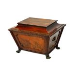 A George IV mahogany cellarette of sarcophagus form, with split bobbin and spiral fluted mounts,