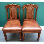 A set of six 19th century Gothic Revival oak dining chairs,