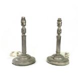 A pair of white metal naval table lamps, 20th century, each cast with a rope,