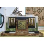 An Art Deco mantel clock, alabaster, onyx and striated marble,