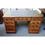 A Victorian mahogany pedestal desk, with nine drawers about the knee, 137cm wide x 77cm deep.