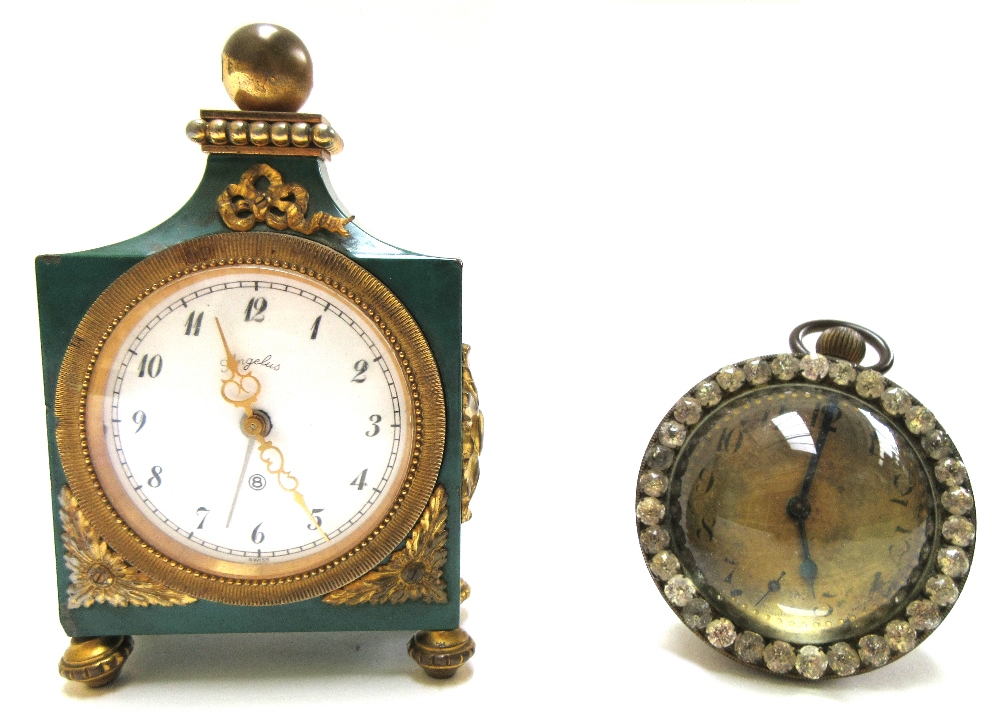 A late 19th century French desk timepiece formed as a glass globe, visible movement to reverse,
