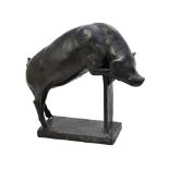 A patinated bronze model of a pig, 20th century, cast with front feet and head resting on a fence,