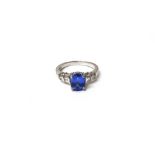 A white gold, tanzanite and diamond ring,