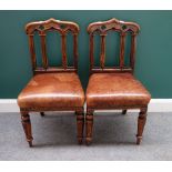 A pair of 19th century Gothic Revival oak dining chairs,