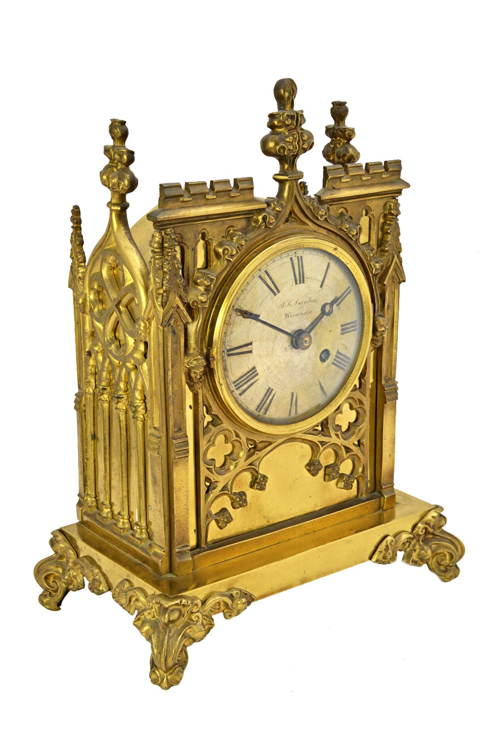 A gilt brass cased mantel clock, 19th century, of Gothic cathedral form,