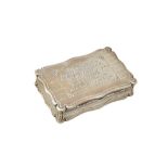 A Victorian silver hinge lidded snuff box, of shaped rectangular form,