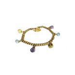 A 9ct gold twin curb link bracelet, fitted with six faceted coloured stone charms,