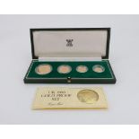 A cased Royal Mint UK 1980 Gold Proof set, five-pounds, two-pounds, sovereign and half sovereign,
