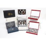 Royal Mint - a collection of twenty-eight cased UK proof coin year sets, 1981, 1983 - 84, 1986,
