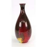 A Royal Doulton flambé bottle vase, by Harry Nixon,