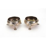 A pair of George II silver cauldron salt cellars, Edward Wood, London 1734, each on three hoof feet,