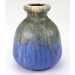 A Ruskin Pottery poppy seed pod-shaped vase, dated 1932,