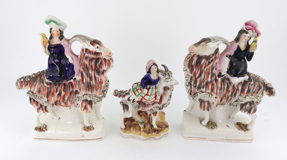 A pair of Staffordshire figures of children kneeling on goats and holding birds, - Image 2 of 5