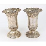 A pair of late Victorian silver flower vases, Samuel Watton Smith, Sheffield 1895, of trumpet shape,