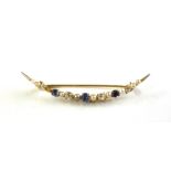 An Edwardian gold, sapphire, pearl and diamond open crescent brooch,