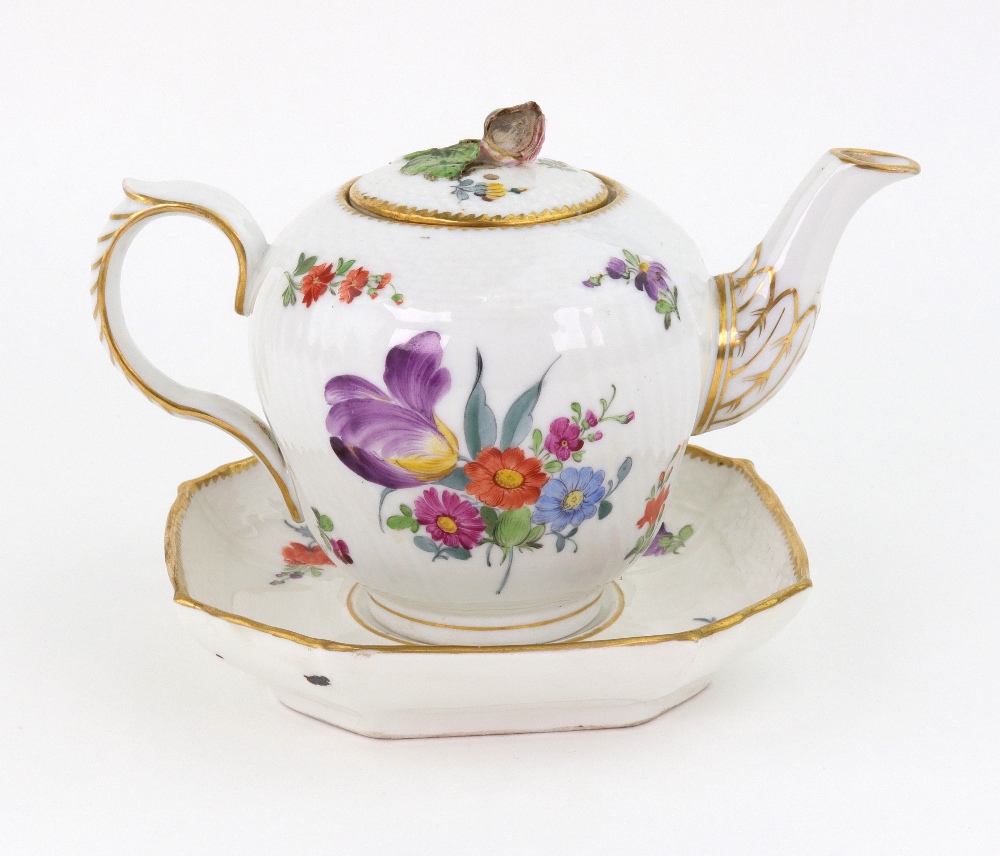 A Copenhagen porcelain ogee silver shape teapot and stand, 19th century, painted with flowers,