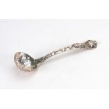 A Victorian cast Chased Vine pattern sifter spoon, George W Adams, London 1861, 15.5cm long, 2ozs.
