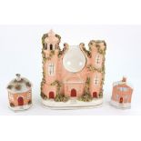 A Staffordshire pottery pocket watch stand in the form of a castle, 21.
