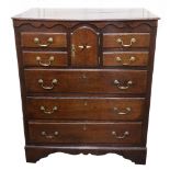 A mid 18th century oak chest, East Anglia, the moulded rectangular top,