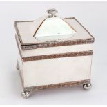 An Old Sheffield plate rectangular biscuit box, with domed hinged cover, raised foliate bands,