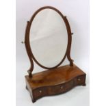 A George III mahogany boxwood banded oval swing toilet mirror,