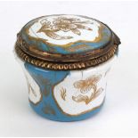 A circular turquoise, white and gilt foliate enamelled box, second half 18th century,