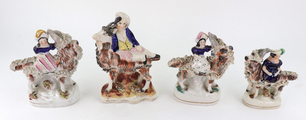 A pair of Staffordshire figures of children kneeling on goats and holding birds, - Image 4 of 5