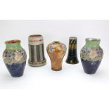 Five Royal Doulton stoneware vases, including a pair,