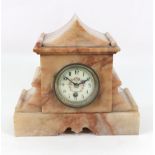 A Victorian veined onyx marble cased mantel timepiece, circa 1870, of shaped outline,