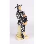 A Royal Doulton figure 'A Jester' 'HN45', version one, after a model by Charles Noke,