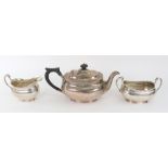 A George III style silver three-piece tea service, Charles Clement Pilling retailed by Harrods,