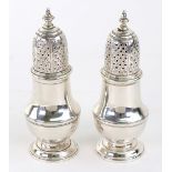 A pair of George II silver vase shape casters, London 1754 & 1755,