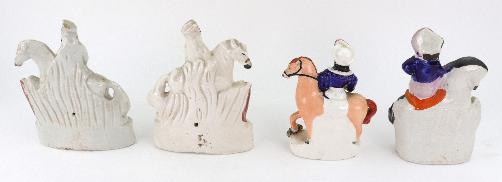 A pair of Staffordshire pottery figures of a boy and girl on horseback jumping fences, 16cm high, - Image 5 of 5