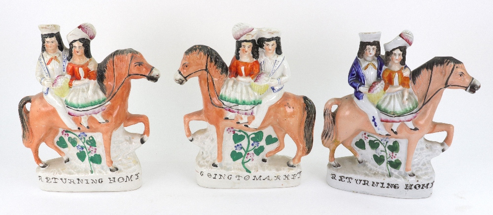 A pair of Staffordshire pottery figures of a boy and girl on horseback jumping fences, 16cm high, - Image 2 of 5