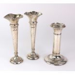 A pair of Art Nouveau spot hammered silver trumpet shape vases, Mitchell & Cooper, circa 1907,